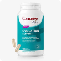 Conceive Plus Ovulation Bundle (ES) featuring Ovulation Support bottle in Spanish packaging with a teal label and two visible beige vegetarian capsules placed beside the bottle to illustrate supplement form.
