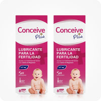 Conceive Plus Fertility Lubricant Pack (ES) twin-pack of 8x4 prefilled applicator boxes, displayed with identical magenta packaging, Spanish text, baby illustrations, and icons for pH balance and essential minerals.





