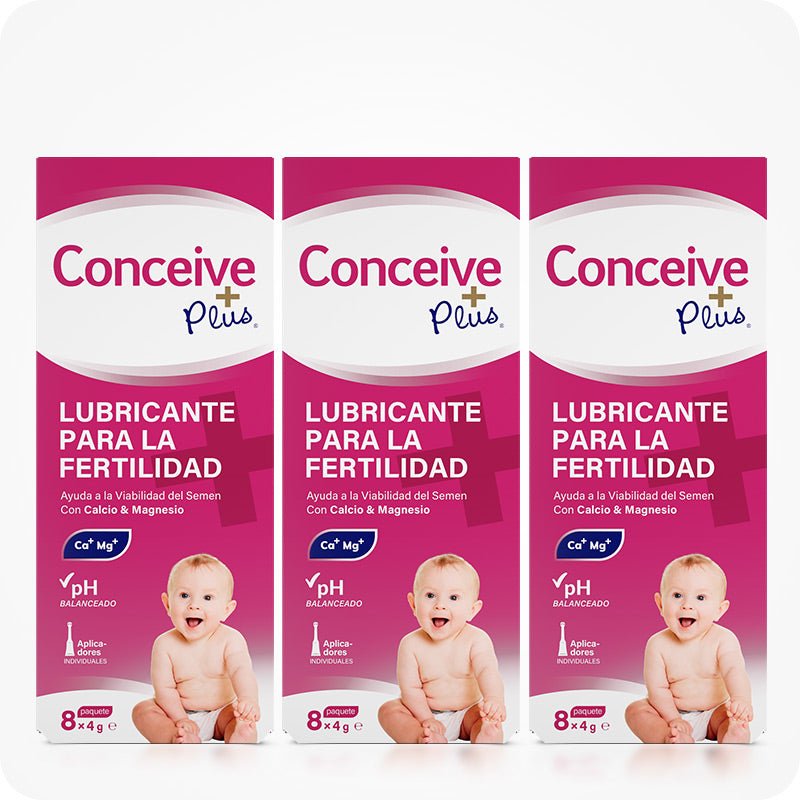 Conceive Plus Fertility Lubricant Pack (ES) triple-pack of 8x4 prefilled applicator boxes for comprehensive fertility support, displayed with three identical magenta packages in Spanish, each showing a baby image and icons for pH balance and essential minerals.
