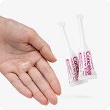Conceive Plus Fertility Lubricant Pack (ES) with prefilled applicators for individual use, shown with a close-up of a hand holding a dab of clear lubricant and two slim white applicators featuring pink Conceive Plus branding.