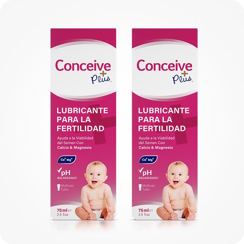 Conceive Plus Fertility Lubricant Pack (ES) twin-pack with two 75ml boxes, shown with matching magenta packaging, Spanish labeling, baby graphics, and icons for pH balance and essential minerals.