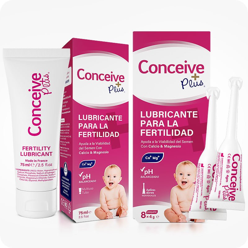 Conceive Plus Fertility Lubricant Pack (ES) featuring a 75ml multi-use tube and a box of 8 prefilled applicators for fertility support, displayed with a white tube, two magenta-toned boxes in Spanish, and two white applicators angled beside the packaging.