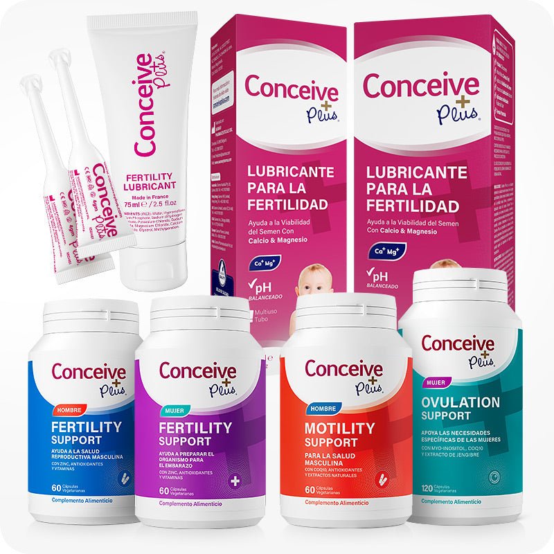 Conceive Plus Maximum Fertility Bundle (ES) with Fertility Lubricant, Women's and Men's Fertility Support, Ovulation Support, and Motility Support supplements in a 6-product bundle for reproductive health — image shows neatly arranged products including lubricant tube with applicators, Spanish-labeled lubricant boxes, and four distinct supplement bottles in vibrant colors, all set against a white background.