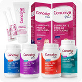 Conceive Plus Maximum Fertility Bundle (ES) with Fertility Lubricant, Women's and Men's Fertility Support, Ovulation Support, and Motility Support supplements in a 6-product bundle for reproductive health — image shows neatly arranged products including lubricant tube with applicators, Spanish-labeled lubricant boxes, and four distinct supplement bottles in vibrant colors, all set against a white background.