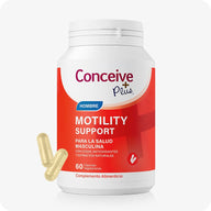 Conceive Plus Men's Motility Support (ES) dietary supplement bottle with 60 vegetarian capsules for male reproductive health shown with a bright red and white label featuring bold text in Spanish and two beige capsules placed at the bottom left on a white background.