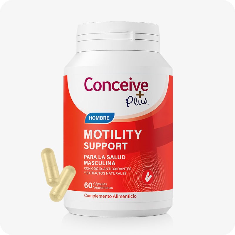 Conceive Plus Men's Motility Support (ES) dietary supplement bottle with 60 vegetarian capsules for male reproductive health shown with a bright red and white label featuring bold text in Spanish and two beige capsules placed at the bottom left on a white background.