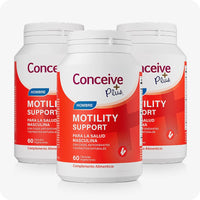 Conceive Plus Men's Motility Support (ES) triple pack of male fertility supplements featuring 60 vegetarian capsules per bottle displayed as three red and white labeled containers in Spanish, arranged in a triangular layout on a white background.