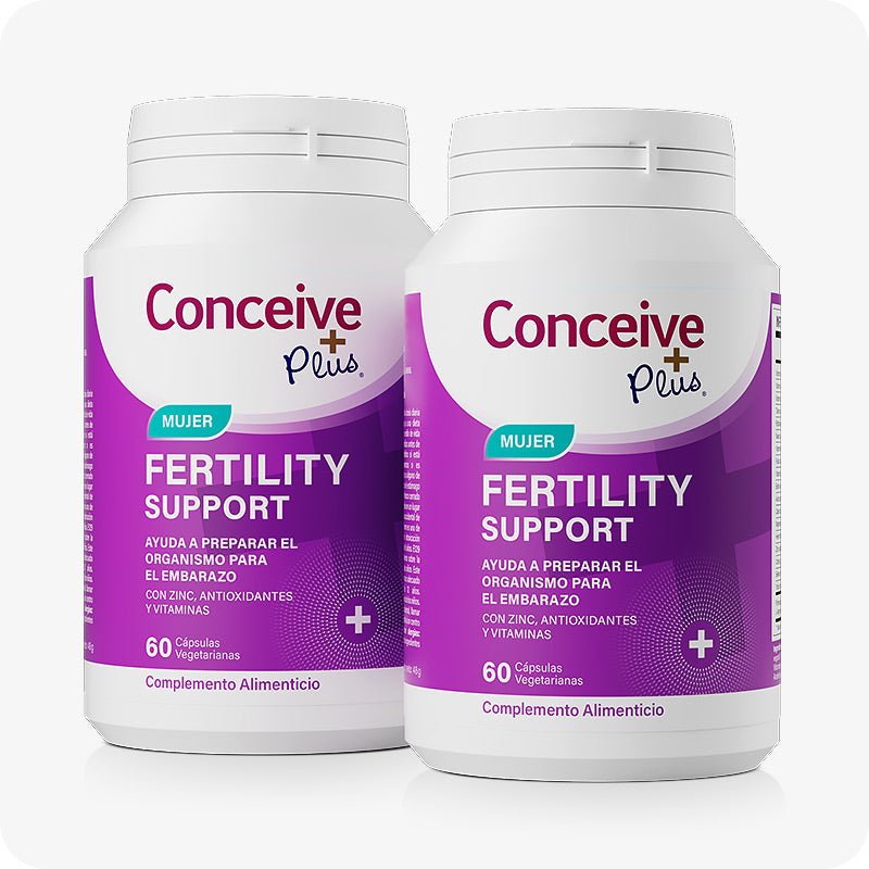 Conceive Plus Ovulation Bundle (ES) with a front-facing view of two bottles of Women's Fertility Support in Spanish packaging, both featuring bold purple labels and white caps, visually emphasizing a double pack presentation for enhanced fertility supplementation.